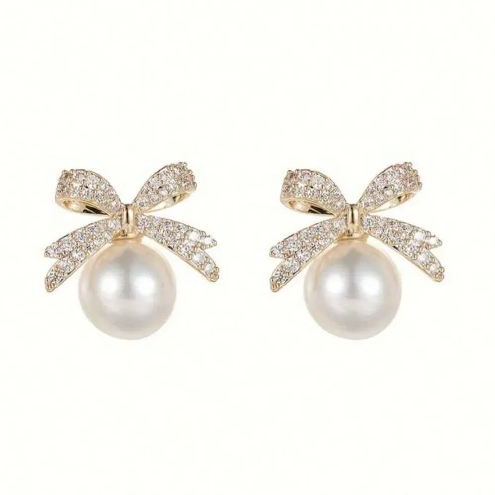 Bow pearl detail earring N774